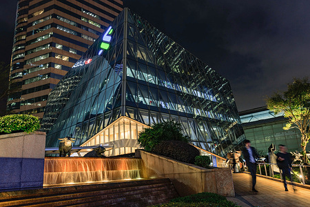 Logo of Standard Chartered Bank seen outside Standard Chartered Bank Building in Central, Hong Kong.