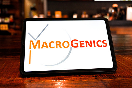 In this photo illustration, the MacroGenics logo is displayed on the screen of a smart tablet.
