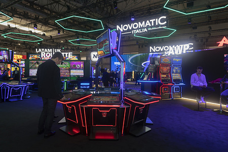 A man seen playing at Novomatic Gaming booth, a gaming platform, during the third day of the International Casino Exhibition (ICE) Barcelona 2026 at the Fira de Barcelona. The third and final day of International Casino Exhibition (ICE) Barcelona 2026, held on January 21 at the Fira de Barcelona Gran Via, served as the grand finale for what has been described as the largest gathering in the history of the international gaming industry. With attendance projected at over 65,000 delegates from 180+ nations, the final day focused on cementing business partnerships and exploring the "tactical breakdown" of emerging sectors like esports, including sessions on titles like Counter-Strike 2. A significant highlight of the day was the Academia America Latina, a dedicated seminar on the Enterprise Stage that addressed the surging opportunities and regulatory landscapes in Latin American markets. The exhibition floor, spanning five halls, buzzed with the last of an estimated 1.5 million business meetings as over 600 global exhibitors showcased approximately 25,000 product launches. As the event concluded, the focus shifted to responsible gaming and the industry's collective efforts to combat illegal markets, a theme championed by the World Gaming Forum throughout the week.