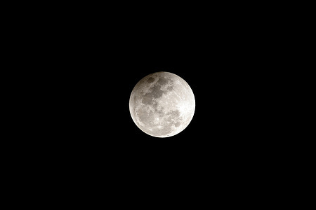 A total lunar eclipse, known as a “Blood Moon,” is seen in the night sky during Magha Puja Day at Wat Phra Bat Tak Pha. The astronomical phenomenon, which later turns the full moon into a reddish “Blood Moon,” coincides with the important Buddhist holiday observed nationwide as devotees gathered at the hilltop temple to observe religious rites under the full moon.