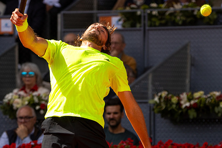 Greek Stefanos Tsitsipas plays against Italian Lorenzo Musetti (not visible) during a match at the 2025 Mutua Madrid Open, held at La Caja Mágica. Final score: 5-7 6-7 for Musetti