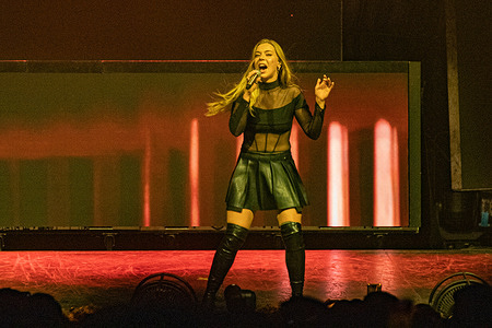 Becky, a British singer and songwriter known for her powerful voice and numerous collaborations with electronic dance music producers performs during Katy Perry's concert for Becky Hill live at Unipol Arena.