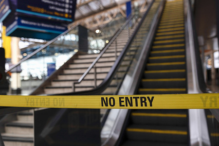 A "No Entry" line is seen to close part of the Waterloo station due to the National Railway strike. Rail workers from Rail, Maritime, and Transport (RMT) Union began the biggest rail strike in the UK in three decades on Tuesday after unions rejected a last-minute offer from train companies, bringing services nationwide to a near standstill. Over 80% of the services are expected on hold due to the walkout.