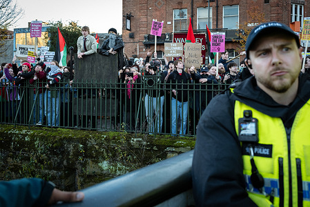 A police officer stands in front of a counter demonstration. Stand Up to Racism took to the streets to counter-protest UKIP. UK Independence Party leader Nick Tenconi marched through the city for the latest leg of The Mass Deportations Tour, which wants to see the end of illegal immigration.