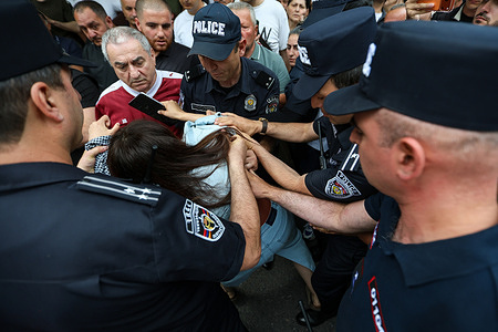 Police detain a woman during the rally. Armenia’s Central Election Commission (CEC) has certified the results of the June 7 parliamentary elections, confirming that Prime Minister Nikol Pashinyan’s Civil Contract party secured 49.74% of the vote, enough to form a government independently without coalition partners. The Prosperous Armenia party, led by billionaire Gagik Tsarukyan, narrowly failed to clear the 4% parliamentary threshold and called on its supporters to gather outside the CEC building in protest. Opposition, rejecting the outcome as illegitimate, addressed crowds demanding a rerun of the vote.
