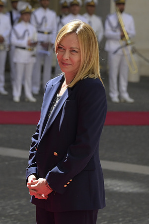 Giorgia Meloni waiting to receive the President of the Slovak Republic at Palazzo Chigi.