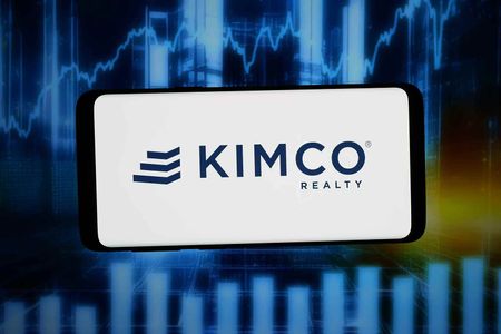 In this photo illustration, the logo of US REIT company Kimco Realty Corporation is displayed on a smartphone in front of abstract background on computer screen.