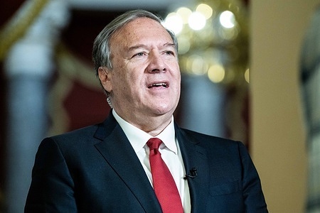 Former U.S. Secretary of State Mike Pompeo is interviewed on television at the U.S. Capitol.