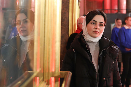 A volunteer attends the Orthodox Easter service behind closed doors at Kazan Cathedral.The Easter service was broadcasted on TV, as the government instructed citizens to stay home in order to avoid the spread of coronavirus. At least 36793 cases of coronavirus and 313 death have been confirmed in Russia.
