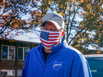 Rodney Creech (R, Ohio), who is running for Ohio State Representative, stands outside of a polling location at Precious Blood Church on Election Day.
Being the national presidential election, other candidates are hoping to secure last-minute votes by making rounds campaigning at polling locations before the polls close. Desiree Tims (D, Ohio) for Congress campaigns and speaks with constituents outside polling stations as she hopes to unseat incumbent Congressman Mike Turner (R, Ohio).