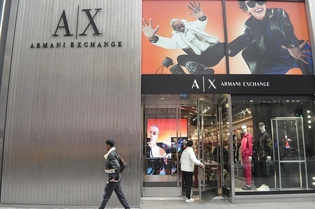 A customer enters an Armani Exchange store on Fifth Avenue in Manhattan, New York City.