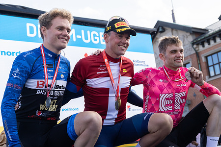 (L-R) Silver medalist Niklas Larsen of BHS-PL Beton Bornholm, gold medalist Mads Pedersen of Team Lidl-Trek and bronze medalist Kasper Asgreen of Team EF Education - EasyPost pose on the podium during the medal ceremony after the Men's Elite Individual Time Trial at the Danish Championships. When DM Week returns to Aalborg from 23-29 June 2025, there will be more sports than ever before, new disciplines on the program and an entire city in motion. During an intense week, some of Denmark's most talented athletes will compete for DM gold in over 120 disciplines - from classics like cycling and swimming to high diving from the Limfjord Bridge, dance, speedway and 3x3 basketball. This will be the fourth time DM Week has been held, and the third time Aalborg has hosted it.