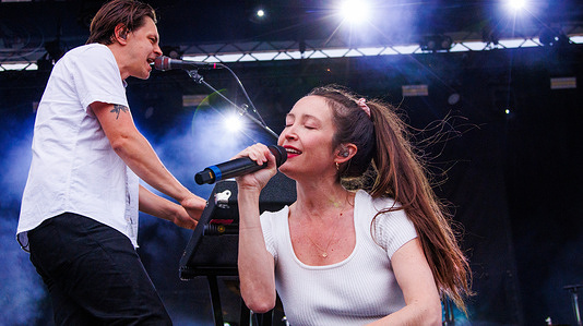 July Talk's Peter Dreimanis (L) and Leah Fay Goldstein (R) perform during the K-Days Music Fest at the Edmonton Expo Centre and Fairgrounds.