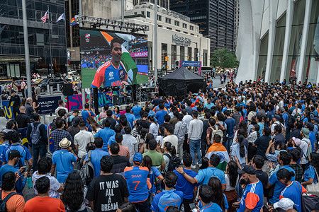 Supporters of the India National Cricket Team celebrate in the North Oculus Plaza in New York City, after India won the ICC Men's T20 World Cup final cricket match against South Africa.