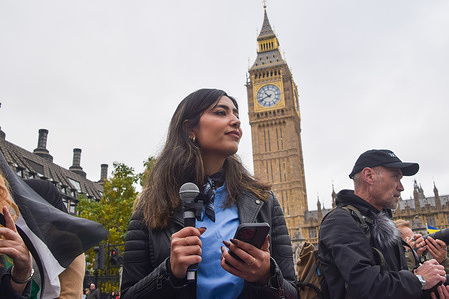Dr. Tamara Ali gives a speech during the demonstration in Parliament Square. Pro-Palestine healthcare workers and protesters gathered in support of free speech and in solidarity with Dr. Rahmeh Aladwan and other medical workers who have faced suspension over their social media posts, and in support of medical workers in Gaza. The protesters are also demanding the resignation of Health Secretary Wes Streeting, whom they accuse of 'serving the Zionist lobby'.