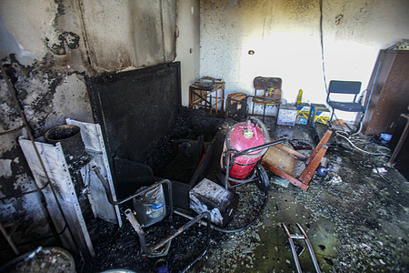 Interior view of a burnt gas station by Jewish settlers during an attack on the town of Al-Laban al-Sharkiyeh, in the northern West Bank. Jewish settlers launched an attack on the Palestinian town Al-Laban al-Sharkiyeh, burning farms, throwing stones at houses, and setting fire to dozens of cars and Palestinian property.