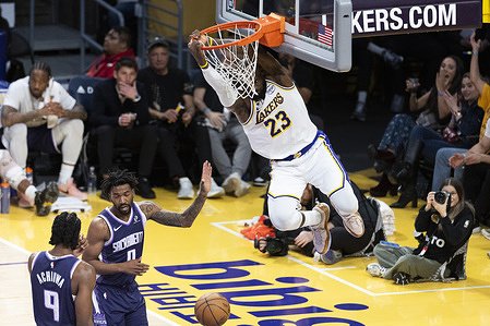 Los Angeles Lakers’ LeBron James (23) dunks against the Sacramento Kings during an NBA basketball game at Crypto.com Arena on Sunday, March 1, 2026 in Los Angeles.