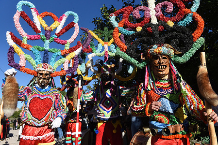 Revelers dressed as Boteiros seen during the Botargas and Mascaradas Festival. Botargas and Mascaritas are medieval origin carnivals in some provinces of Spain. Masks are made with items symbolizing nature and according to the tradition; they parade through the village, defending themselves from the devil spirits, so that they can have a prosperous harvest in the spring.