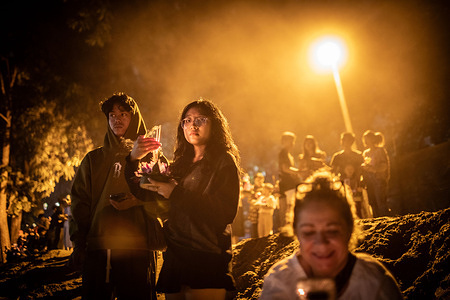 Locals wait their turn to release Kratongs into the river during Yi Peng (Yee Peng) Festival & Loy Kratong in the Old Town. In the north of Thailand, Loy Krathong coincides with the Lanna (northern Thai) festival known as Yi Peng (or Yee Peng) which mean "Full Moon Day", both celebrations take place at the same time, on the full moon night of the 12th month of the Thai lunar calendar to Worship and ask for forgiveness to Goddess of water Ganga for polluting rivers and also to worship the Buddha's hair pagoda in the heaven.