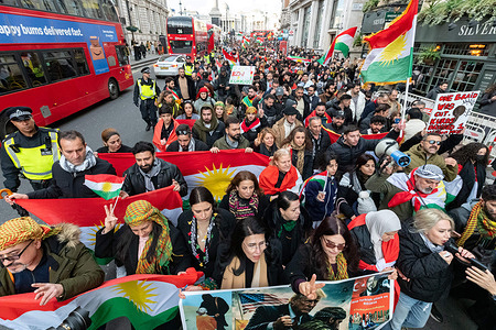 Crowds of protesters march from Trafalgar Square to Downing Street during the demonstration. Kurdish demonstrators gathered in Trafalgar Square in London to protest against aggression and human rights abuses affecting Kurds in Syria. Urging an end to military offensive operations in Syria.