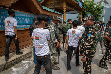 Supporters of the Bharatiya Janata Party (BJP) walk as they celebrate the fourth anniversary of the abrogation of Article 370 and Jammu and Kashmir's special status during a public meeting in Srinagar. Indian Prime Minister Narendra Modi's government repealed Article 370 on 5th August 2019, ending the region's special semi-autonomous status.