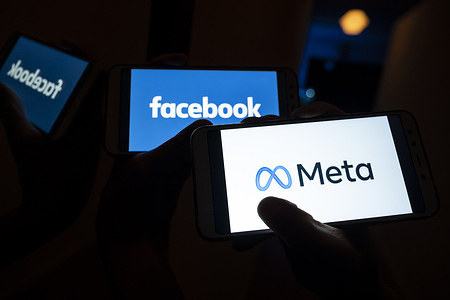In this photo illustration, Meta and Facebook logos seen displayed on a smartphones.
Facebook changes name to Meta in its major rebrand, reportedly by media.
