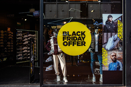 A view of a sports store decorated with a Black Friday banner. A couple of days before Black Friday, stores look already ready for this day. Not all Dutch stores participate, but every year the words Black Friday appear on more and more windows on the shopping streets.
