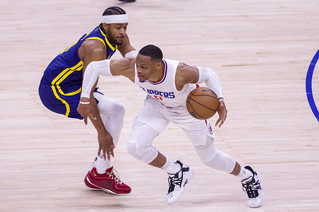 Los Angeles Clippers' Russell Westbrook (R) and Golden State Warriors' Moses Moody (L) seen in action during the NBA basketball game between Clippers and Warriors at Crypto.com Arena. Final score; Clippers 121:113 Golden State Warriors.