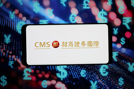 In this photo illustration, the logo of company China Merchants Securities (CMS) is displayed on a smartphone in front of abstract background on computer screen.