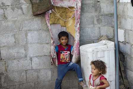 Palestinian children play in the Khan Yunis refugee camp in the southern Gaza Strip during a general strike of all UNRWA educational and health institutions in the Gaza Strip in protest against the recent decisions taken by the Agency's administration towards staff.