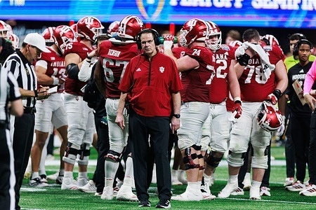 Indiana football coach Curt Cignetti coaches against Oregon during the Chick-fil-A Peach Bowl. The Hoosiers beat the Ducks 56-22.