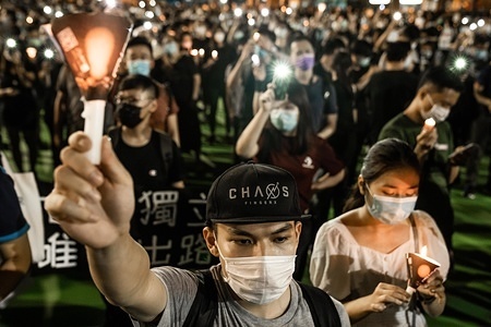 Participants were seen holding up candles which reads "truth" on them during the memorial vigil in Victoria Park.
Thousands gathered for the annual memorial vigil in Victoria Park to mark the 1989 Tiananmen Square Massacre despite a police ban citing coronavirus social distancing restrictions.