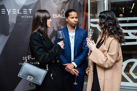Designer Balde (C) seen with guests. Iconic dresses of Atelier Balde and precious accessories made by Eyelet Milano had been presented in an opening party at Spazio Leonardo in Milan. The exhibition will go on until February 25th, during Milan Fashion Week Fall/Winter 2022/23.