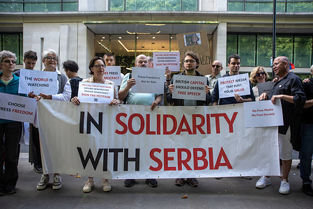 Protesters hold placards and a banner outside BC Partners. A small group from the Serbian diaspora gathered outside BC Partners in solidarity with protesters in Serbia, where demonstrations began after the Novi Sad tragedy in November 2024, when a railway station canopy collapsed, killing 16 people. The tragedy fueled public outrage over government corruption and lack of accountability, sparking one of Serbia’s largest anti-government movements. BC Partners owns the United Group, which operates independent media outlets N1 and Nova S, both vital in reporting on the protests and government misconduct. Protesters outside BC Partners are urging the company to resist political pressure from the Serbian government and safeguard press freedom by protecting the editorial independence of these outlets.