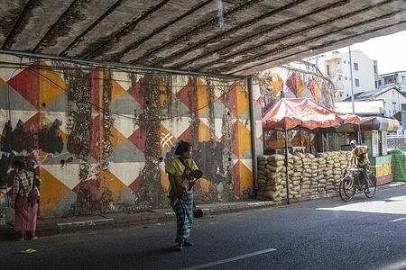 People are seen walking near a bunker.
Myanmar's military detained State Counsellor of Myanmar Aung San Suu Kyi on February 01, 2021 and declared a state of emergency while seizing the power in the country for a year after losing the election against the National League for Democracy (NLD).