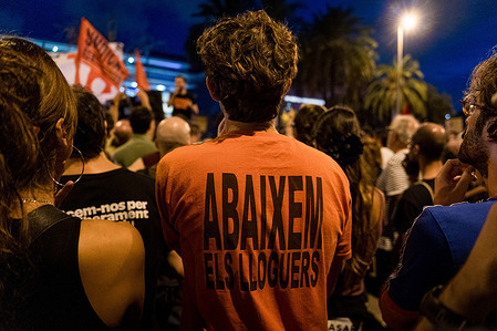 A protester wearing a shirt reading "decrease the rents" is seen during the demonstration. Demonstrations were called in cities all over Spain following the eviction of Mari Carmen, an 87 years old woman in Madrid, from her apartment after it was acquired by an investment fund., who became a symbol of the housing crisis in the country.