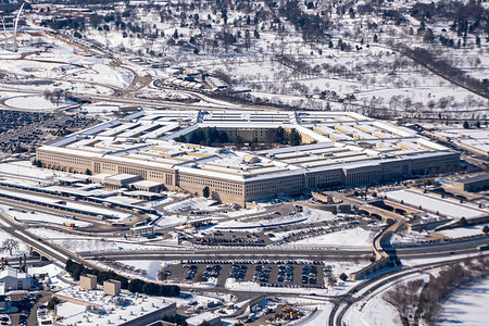 The Pentagon, the headquarters building of the United States Department of Defense, in Arlington County, seen covered in snow.