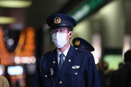 Japanese police officer wearing a face mask as a preventive measures against the spread of Covid-19 seen on duty in Shibuya district at night.
The government will lift the state of emergency in Tokyo region on March 21, 2021.