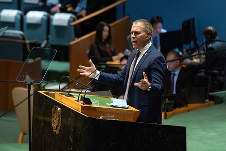 Gilad Erdan, Permanent Ambassador of the United Nations holds up the UN Charter while speaking to the General Assembly on Palestine's membership to the United Nations at the UN Headquarters. The United Nations General Assembly votes to determine if the State of Palestine is qualified and should be admitted as a member of the United Nations.