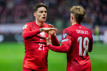 Nicola Zalewski (L) and Michal Skoras (R) of Poland celebrate a goal seen during the European Qualifiers for the 2026 FIFA World Cup match between Poland and Netherlands at PGE Narodowy Stadium. Final score; Poland 1:1 Netherlands.
