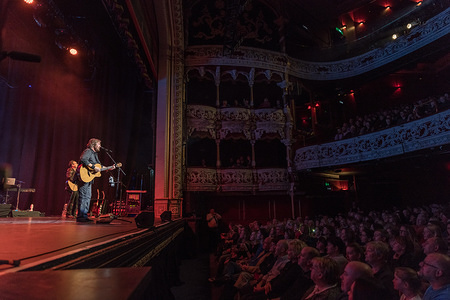 Dr. Hook seen playing guitar while performing live music on stage at Dublin's Olympia Theatre.