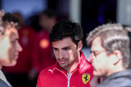 Carlos Sainz of Spain and Scuderia Ferrari speaking with his manager and Lando Norris of Great Britain and McLaren Formula 1 Team in the paddock ahead of the F1 Grand Prix of Australia at the Albert Park Grand Prix circuit.