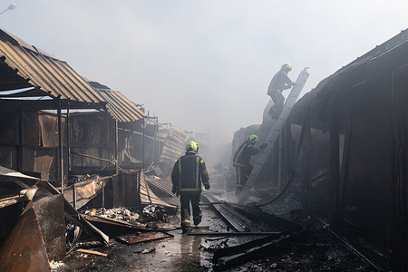 Firefighters seen extinguishing a massive fire at the Pochayna book market following a destructive nighttime attack. On the night of August 16, 2026, a massive Russian air strike on Kyiv caused severe destruction and a large-scale fire at the "Pochaina" book market (formerly known as Petrivka) in the Obolon district. The enemy attack completely burned down several rows of trading pavilions containing books and stationery just ahead of the new school year. Emergency response teams worked at the scene to extinguish the blaze, which spread across a vast area. According to preliminary reports from city authorities, at least three people were injured as a result of the overnight attack. The destroyed marketplace had operated in the capital for nearly 30 years and stood as one of the largest hubs for book trade in Ukraine.