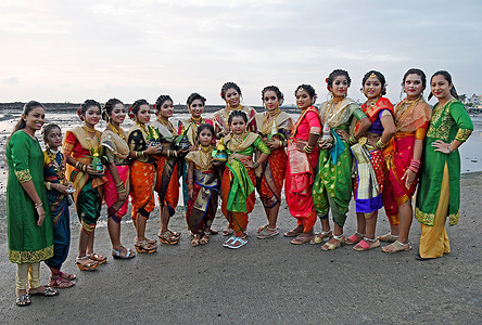 People from the fishing community celebrate the coconut day or 'Narali Purnima' at a beach in Mumbai.
Fishermen worship the sea by offering flower and coconut. It marks the end of monsoon season & fishermen can begin fishing safely.