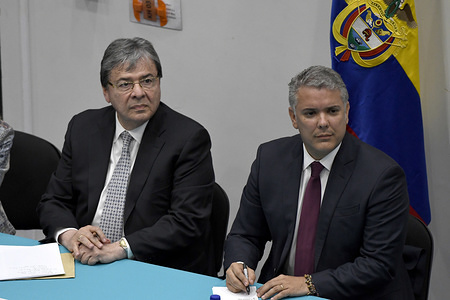 (L to R) Colombian’s foreign minister Carlos Holmes Trujillo and Colombian’s President Ivan Duque seen during a meting with Colombian community at Southbank University in London.

Colombian community met in South Bank University with Colombian President Ivan Duque as part of the official visit to London. Participants in the meeting asked questions to the president about fracking, environmental issues, the peace process implementation, and questioning the risk that social leaders in Colombia face.