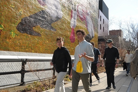 People walk on the High Line in Manhattan, New York City.