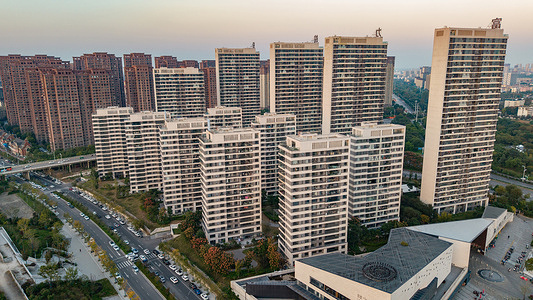 (EDITOR'S NOTE: Image taken with drone)
An aerial view of a residential complex with a mix of mid-rise and high-rise buildings, surrounded by roads, greenery, and other urban developments.