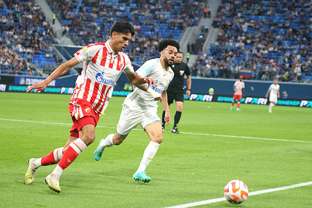 Marko Stamenic (L) of Crvena Zvezda Belgrad and Claudio Luiz Rodrigues Parise Leonel, Claudinho (R) of Zenit in action during the Pari Premier Cup football match between Zenit Saint Petersburg and Crvena Zvezda Belgrad at Gazprom Arena. Crvena Zvezda FC team won against Zenit FC with a final score of 2:1.