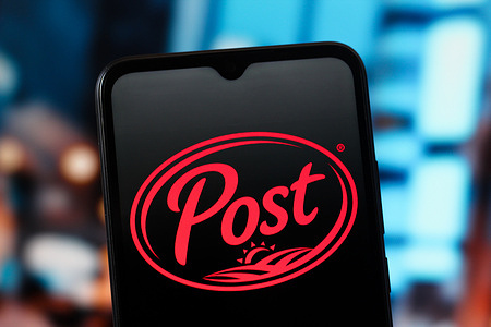 In this photo illustration, the Post Holdings logo is seen displayed on a smartphone screen.