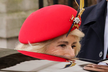 Queen Camilla wears a beret pronouncing 'death or glory' as she attends the 97th year of the Field of Remembrance at Westminster Abbey in London. The Field of Remembrance has been organised by The Poppy Factory and held in the grounds of Westminster Abbey since November 1928 to commemorate those who have lost their lives in service to the Armed Forces.